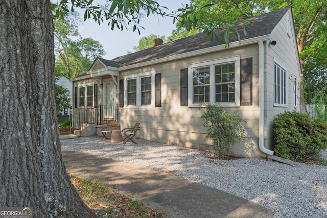 380 Best Dr, Athens, GA 30606 - view of front facade featuring a chimney and roof with shingles