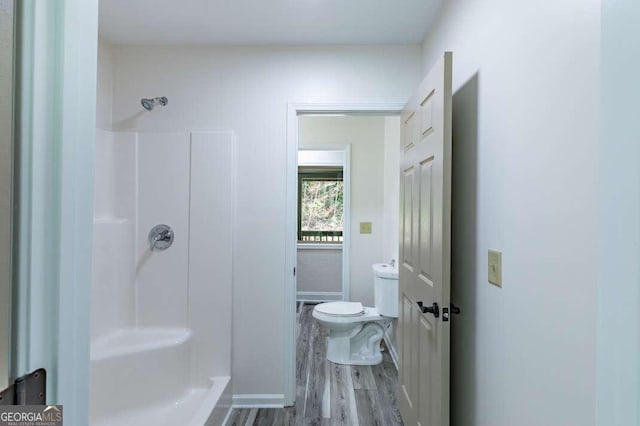 235 Red Bud Ln Unit 5, Hiawassee, GA 30546 - full bathroom featuring a shower stall, toilet, and wood finished floors
