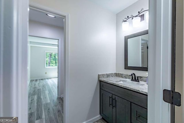 235 Red Bud Ln Unit 5, Hiawassee, GA 30546 - bathroom featuring vanity, wood finished floors, and baseboards