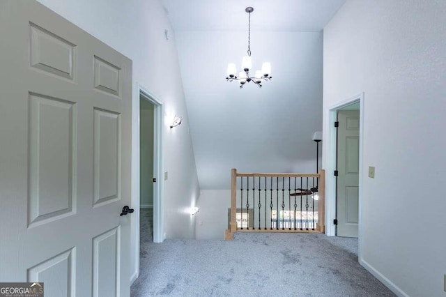 235 Red Bud Ln Unit 5, Hiawassee, GA 30546 - corridor with carpet, a chandelier, and an upstairs landing