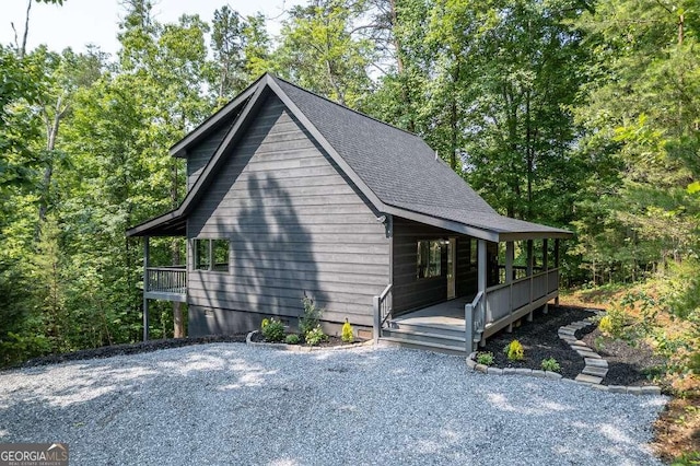 235 Red Bud Ln Unit 5, Hiawassee, GA 30546 - view of property exterior featuring roof with shingles and covered porch