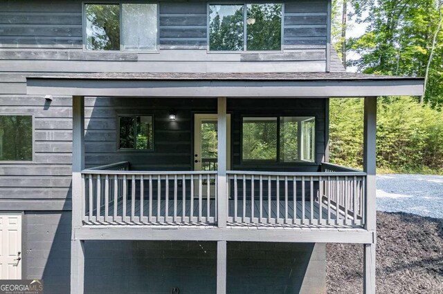 235 Red Bud Ln Unit 5, Hiawassee, GA 30546 - view of exterior entry with covered porch