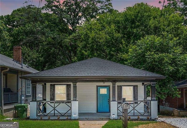 872 Beryl St SW, Atlanta, GA 30310 - bungalow-style house with covered porch and a shingled roof