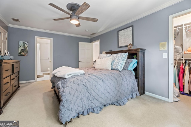 4030 River Ridge Chase Se, Marietta, GA 30067 - bedroom featuring a walk in closet, a closet, carpet flooring, ornamental molding, and baseboards