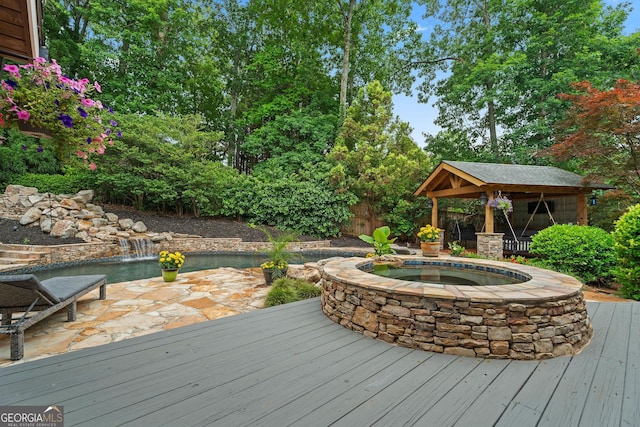 4030 River Ridge Chase Se, Marietta, GA 30067 - deck featuring an in-ground hot tub and a gazebo