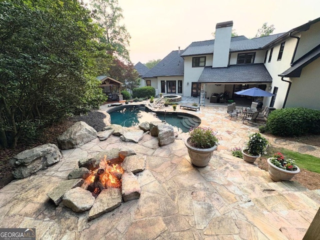 4030 River Ridge Chase Se, Marietta, GA 30067 - outdoor pool with a fire pit, a patio area, a gazebo, and a hot tub