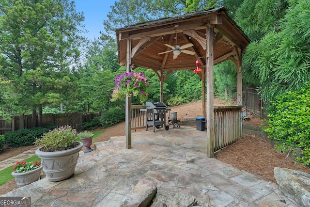 4030 River Ridge Chase Se, Marietta, GA 30067 - fenced backyard with a gazebo, ceiling fan, a grill, and a patio