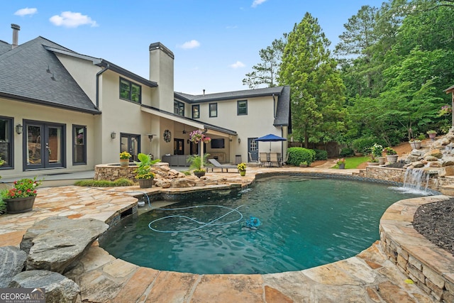 4030 River Ridge Chase Se, Marietta, GA 30067 - swimming pool with french doors and a patio