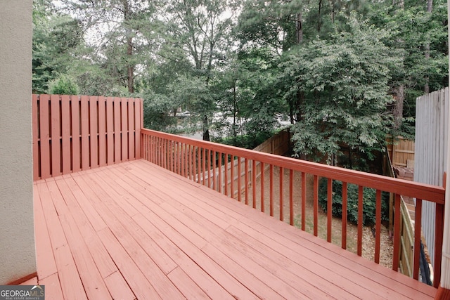 3697 E Bay St, Duluth, GA 30096 - wooden terrace featuring a fenced backyard and view of wooded area