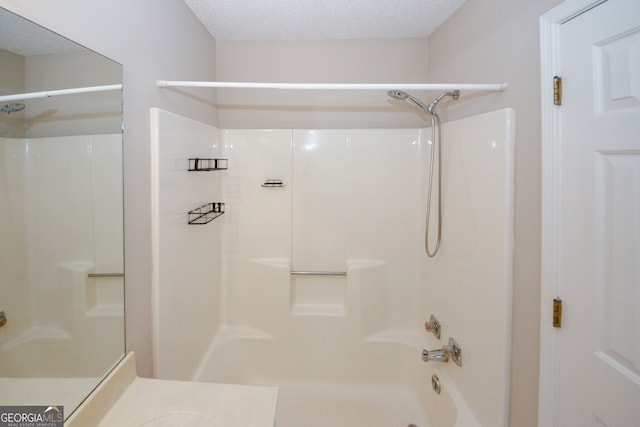 3697 E Bay St, Duluth, GA 30096 - full bath with bathing tub / shower combination and a textured ceiling