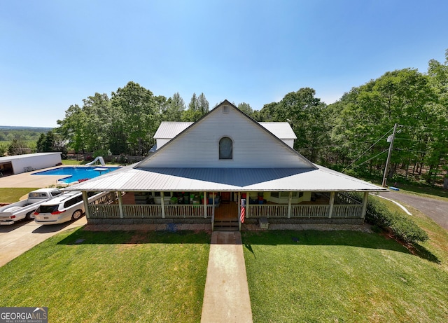 1755 Hunsinger Rd, Shiloh, GA 31826 - country-style home featuring a porch, a front yard, and metal roof