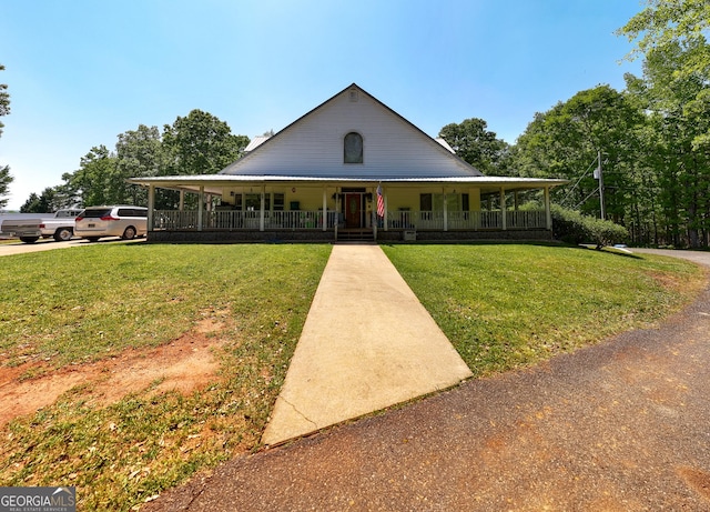 1755 Hunsinger Rd, Shiloh, GA 31826 - farmhouse featuring covered porch and a front yard