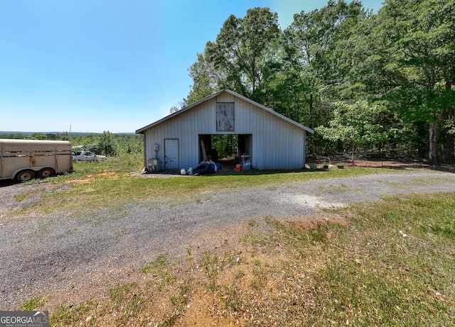 1755 Hunsinger Rd, Shiloh, GA 31826 - view of side of property featuring a pole building, an outdoor structure, and a garage