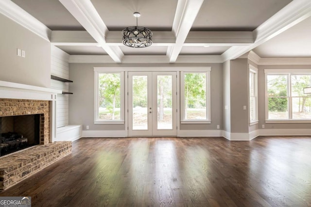4821 Deer Creek Ct, Flowery Branch, GA 30542 - unfurnished living room with a chandelier, healthy amount of natural light, french doors, beamed ceiling, and coffered ceiling