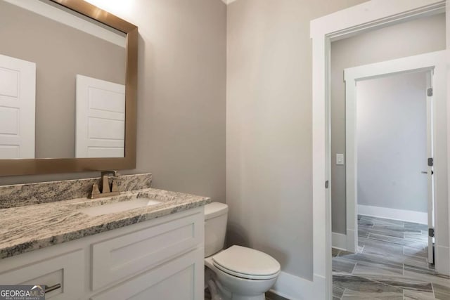 4821 Deer Creek Ct, Flowery Branch, GA 30542 - half bath with vanity and toilet