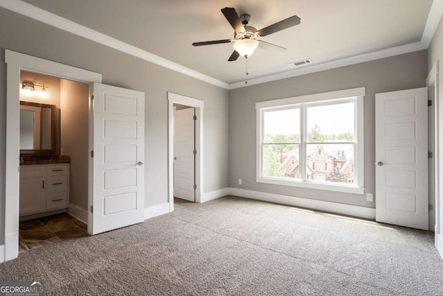 4821 Deer Creek Ct, Flowery Branch, GA 30542 - unfurnished bedroom with carpet flooring, ornamental molding, connected bathroom, and ceiling fan