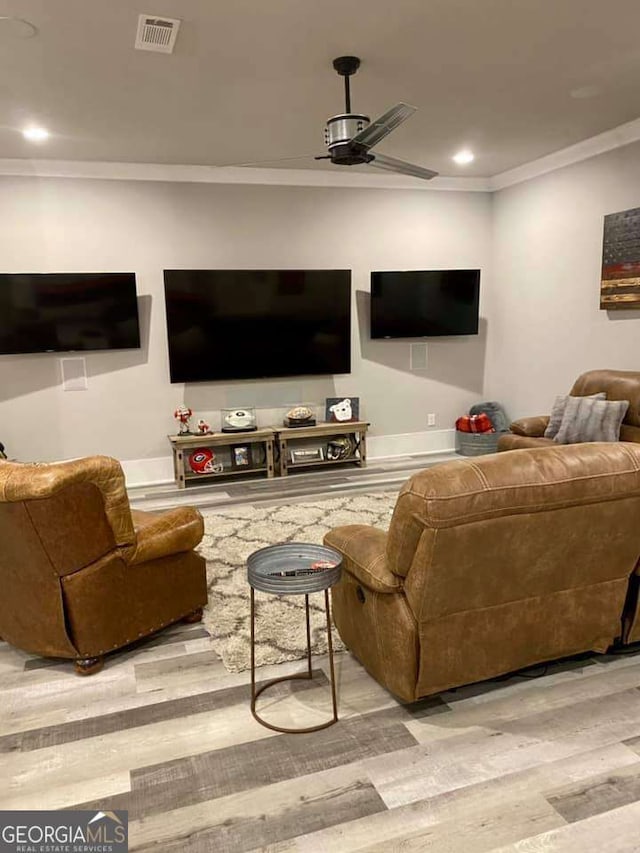 4821 Deer Creek Ct, Flowery Branch, GA 30542 - living area with ornamental molding, wood finished floors, a ceiling fan, and recessed lighting