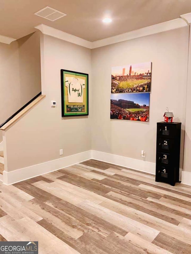 4821 Deer Creek Ct, Flowery Branch, GA 30542 - unfurnished room with light wood-style flooring, stairs, and recessed lighting