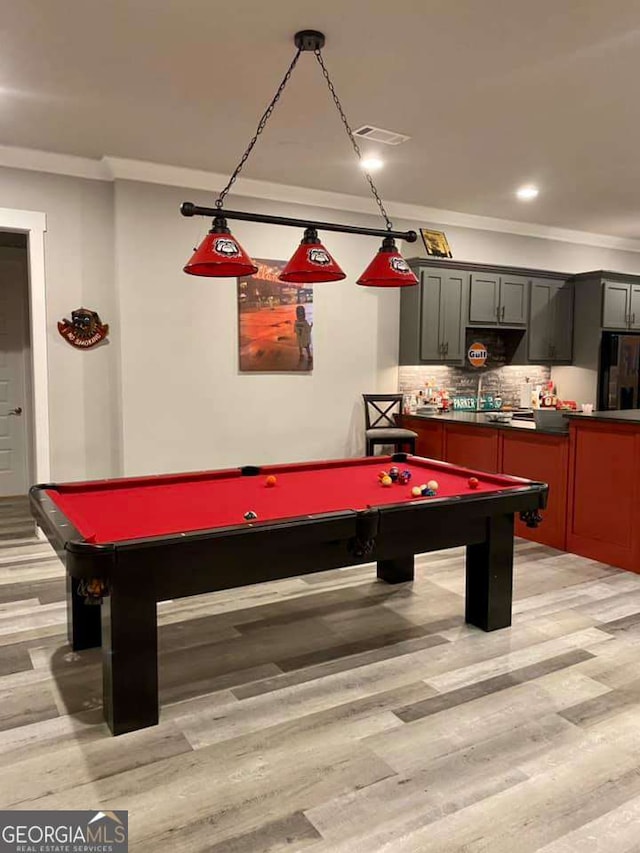 4821 Deer Creek Ct, Flowery Branch, GA 30542 - game room with pool table, ornamental molding, light wood-style flooring, and recessed lighting