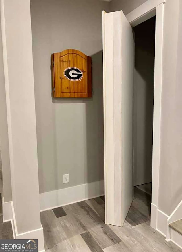 4821 Deer Creek Ct, Flowery Branch, GA 30542 - detailed view of wood finished floors and baseboards