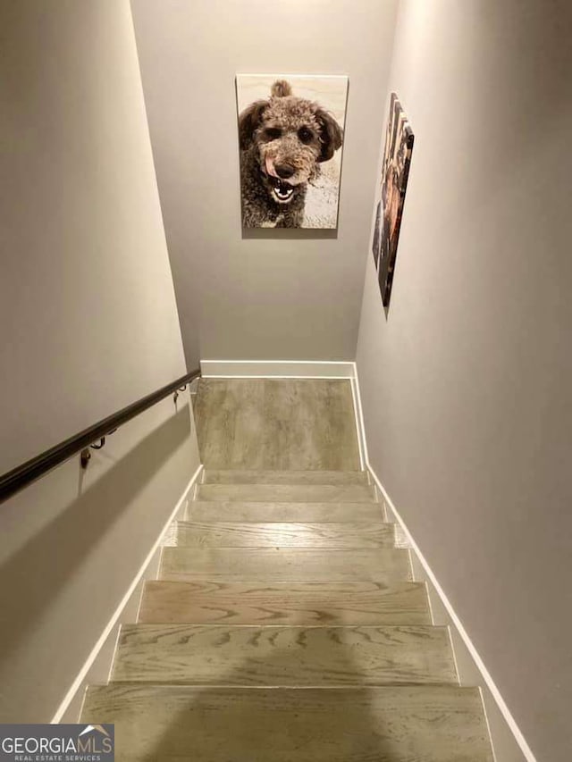4821 Deer Creek Ct, Flowery Branch, GA 30542 - staircase with baseboards