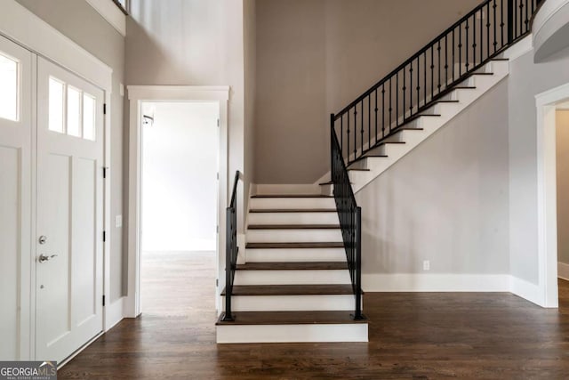 4821 Deer Creek Ct, Flowery Branch, GA 30542 - entryway featuring wood finished floors and stairs
