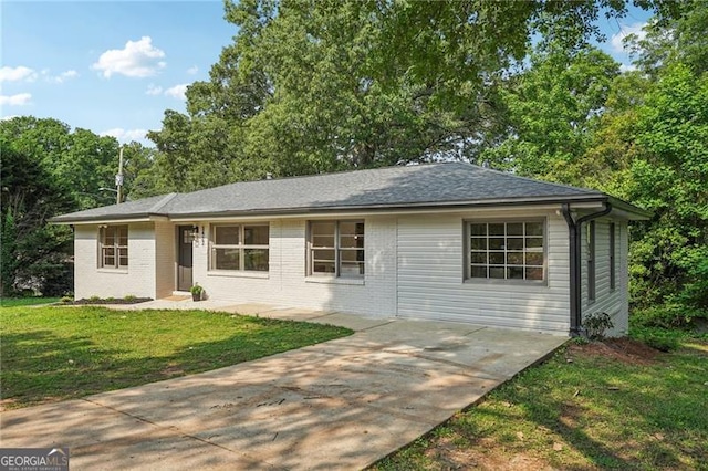 3422 Maplehurst Dr, Decatur, GA 30032 - view of front facade with a front yard, driveway, and brick siding