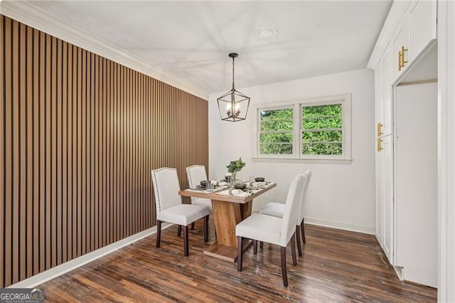 3422 Maplehurst Dr, Decatur, GA 30032 - dining area with dark wood finished floors, a chandelier, and baseboards