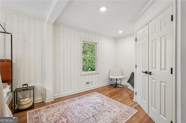 3422 Maplehurst Dr, Decatur, GA 30032 - sitting room with wood finished floors, crown molding, baseboards, and recessed lighting