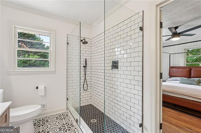 3422 Maplehurst Dr, Decatur, GA 30032 - bathroom featuring connected bathroom, vanity, crown molding, a shower stall, and ceiling fan