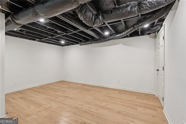 3422 Maplehurst Dr, Decatur, GA 30032 - finished below grade area featuring baseboards and light wood finished floors