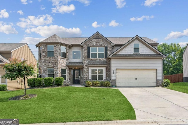 4650 Orchard View Way, Cumming, GA 30028 - craftsman-style house with concrete driveway, stone siding, and an attached garage