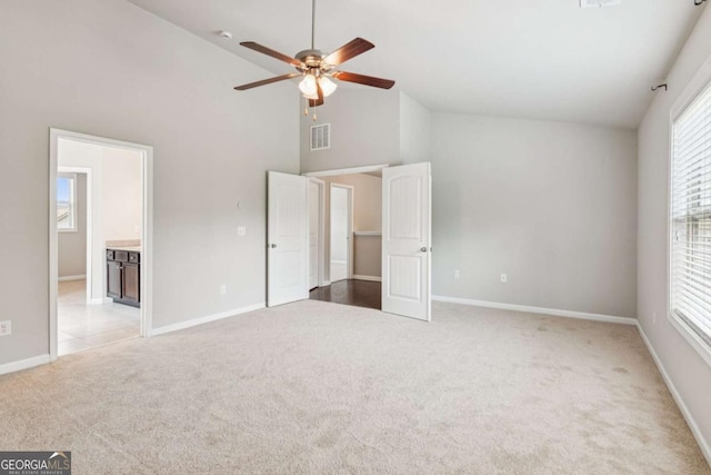 4650 Orchard View Way, Cumming, GA 30028 - unfurnished bedroom with carpet floors, high vaulted ceiling, connected bathroom, and ceiling fan