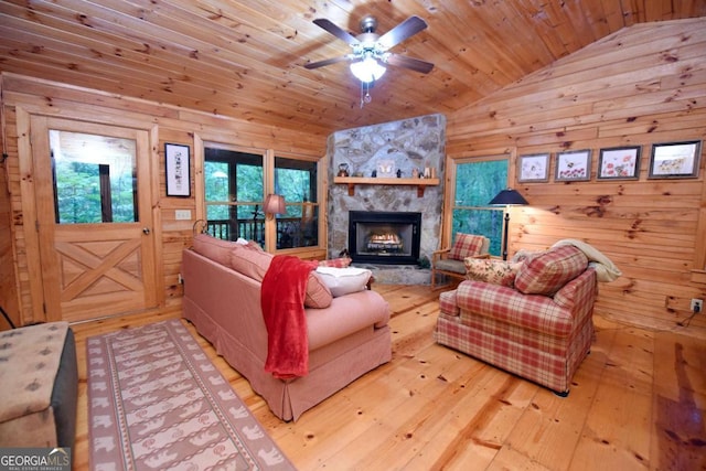58 Hatchet Trl, Cherry Log, GA 30522 - living room with lofted ceiling, wood ceiling, hardwood / wood-style flooring, a ceiling fan, and wooden walls