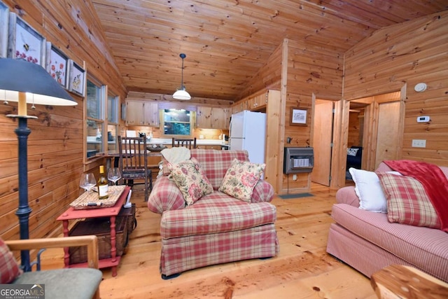 58 Hatchet Trl, Cherry Log, GA 30522 - living area with lofted ceiling, wooden walls, heating unit, light wood-style flooring, and wooden ceiling