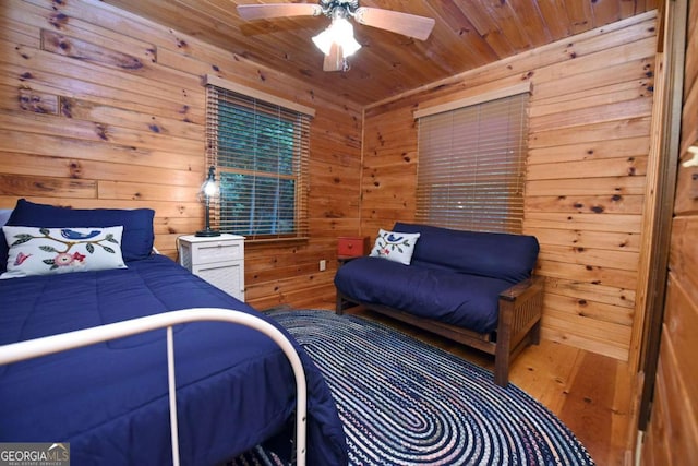 58 Hatchet Trl, Cherry Log, GA 30522 - bedroom with wooden walls, wood ceiling, and a ceiling fan