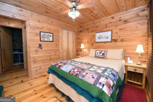 58 Hatchet Trl, Cherry Log, GA 30522 - bedroom with wood walls, wooden ceiling, wood finished floors, and ceiling fan