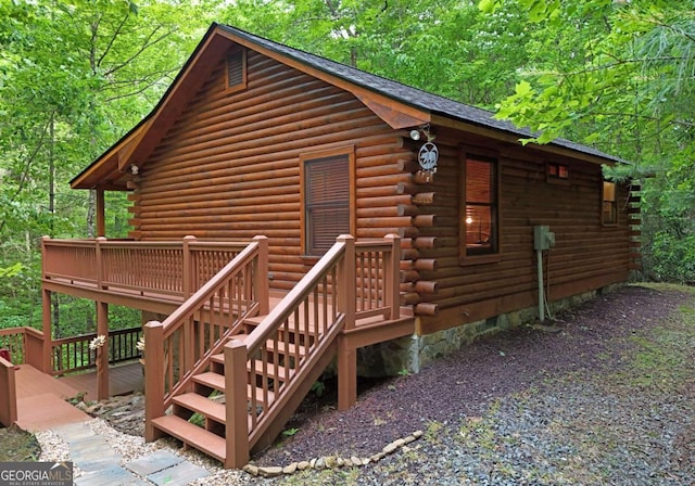 58 Hatchet Trl, Cherry Log, GA 30522 - view of side of property featuring log exterior, a deck, and stairs