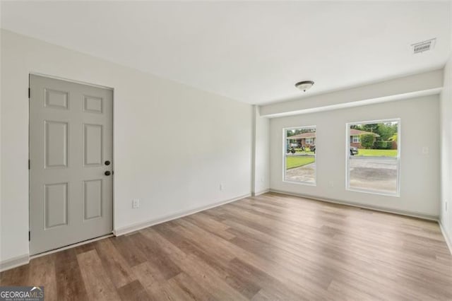 1261 Cliffwood Dr SE, Smyrna, GA 30080 - empty room featuring wood finished floors and baseboards
