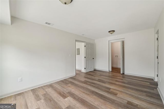 1261 Cliffwood Dr SE, Smyrna, GA 30080 - unfurnished room with wood finished floors and baseboards