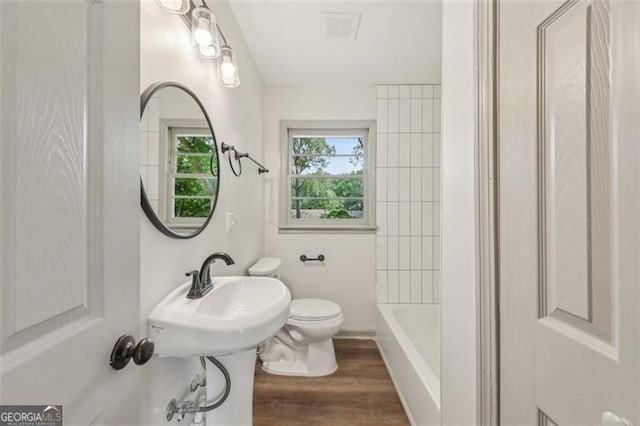 1261 Cliffwood Dr SE, Smyrna, GA 30080 - bathroom featuring toilet and wood finished floors