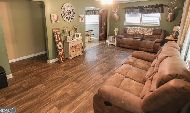 12730 Old Federal Rd, Carnesville, GA 30521 - living room with baseboards, wood finished floors, and ornamental molding