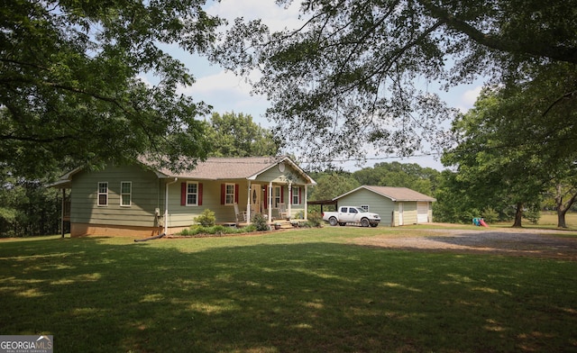 12730 Old Federal Rd, Carnesville, GA 30521 - ranch-style home featuring covered porch, driveway, a front lawn, and an outbuilding