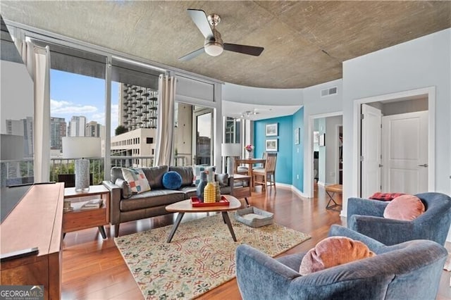 855 Peachtree St NE Unit 501, Atlanta, GA 30308 - living area featuring ceiling fan, wood finished floors, and a view of city