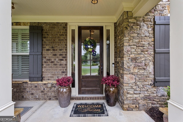 2579 Lulworth Ln, Marietta, GA 30062 - entrance to property featuring stone siding, covered porch, and brick siding