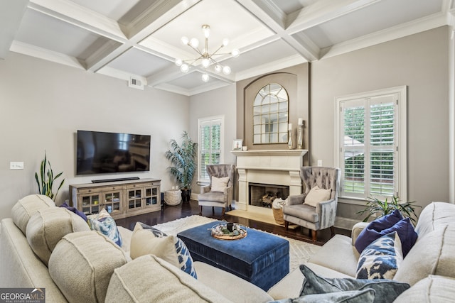 2579 Lulworth Ln, Marietta, GA 30062 - living room featuring coffered ceiling, wood finished floors, healthy amount of natural light, a chandelier, and beamed ceiling