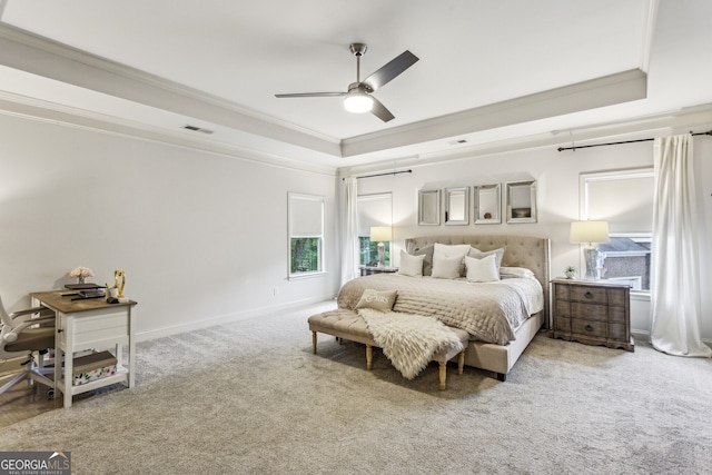 2579 Lulworth Ln, Marietta, GA 30062 - bedroom with a raised ceiling, crown molding, carpet floors, a ceiling fan, and baseboards
