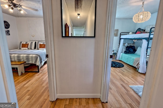 41 Mike Foster Ln, Clayton, GA 30525 - hallway with wood finished floors and a textured ceiling