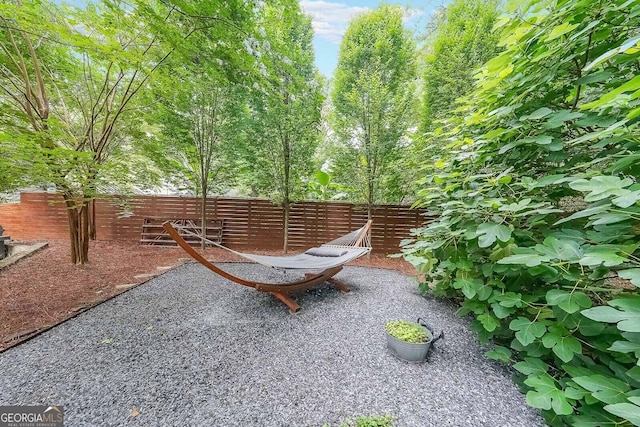 1267 Thomas Rd, Decatur, GA 30030 - fenced backyard with a patio
