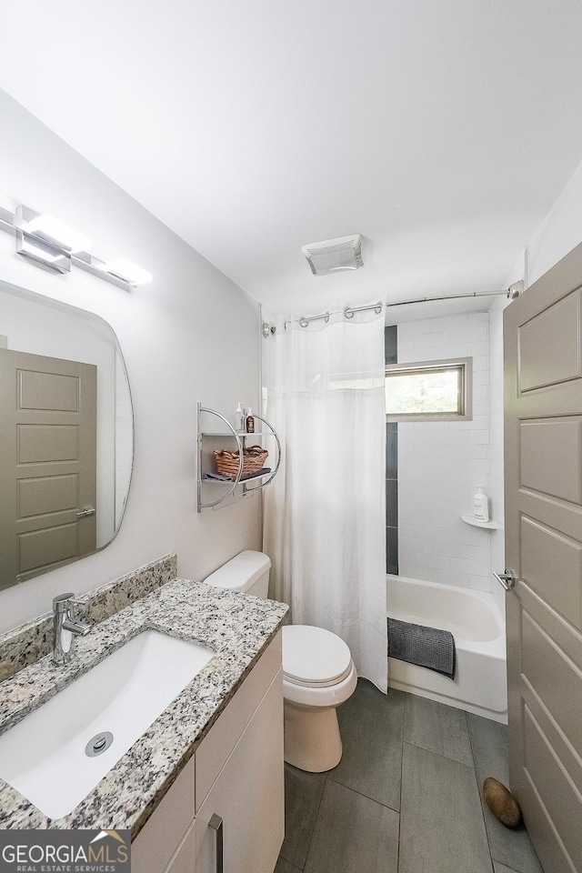 1267 Thomas Rd, Decatur, GA 30030 - full bathroom with toilet, vanity, and shower / bath combo with shower curtain